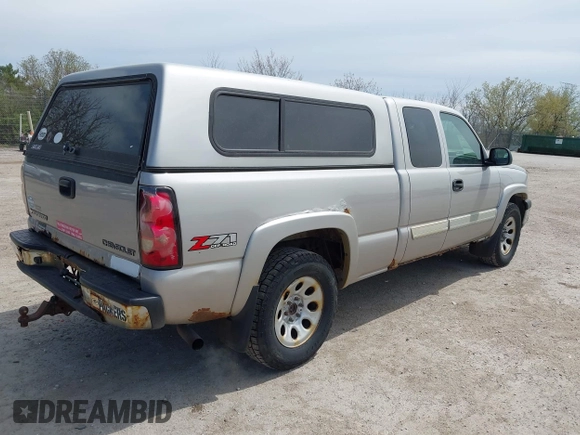 2005 Chevrolet Silverado 1500 LS with VIN 1GCEK19T65Z194720, listed as a IAAI auction lot 42157104 with 156,376 mi miles. Bid and sale history available at carsss.com. Image 4.