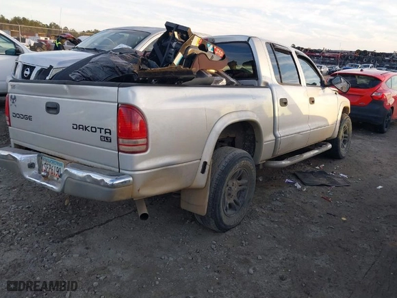 2004 Dodge Dakota SLT with VIN 1D7HL48N74S759634, listed as a IAAI auction lot 41224619 with 1 mi miles. Bid and sale history available at carsss.com. Image 4.