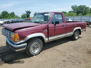 1990 Ford Ranger with VIN 1FTCR10T3LUA40198, listed as a Copart auction lot 61176055 with 34,908 mi miles and Salvage title. Bid and sale history available at DreamBid. Image 1.