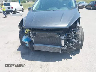 2018 Ford Escape Titanium with VIN 1FMCU9J99JUD43804, listed as a IAAI auction lot 41101250 with 56,438 mi miles and . Bid and sale history available at DreamBid. Image 6.