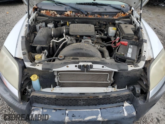 2006 Mitsubishi Raider z VIN 1Z7HT38K16S538273, wystawiony jako Copart lot #79407094 z przebiegiem 67 758 mil mil oraz Szkoda całkowita • Salvage title. Historia ofert i sprzedaży dostępna na DreamBid. Obrazek 11.