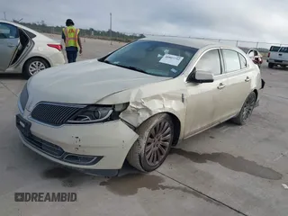 2015 Lincoln MKS with VIN 1LNHL9DKXFG607951, listed as a IAAI auction lot 40807752 with 207,097 mi miles. Bid and sale history available at carsss.com. Image 18.