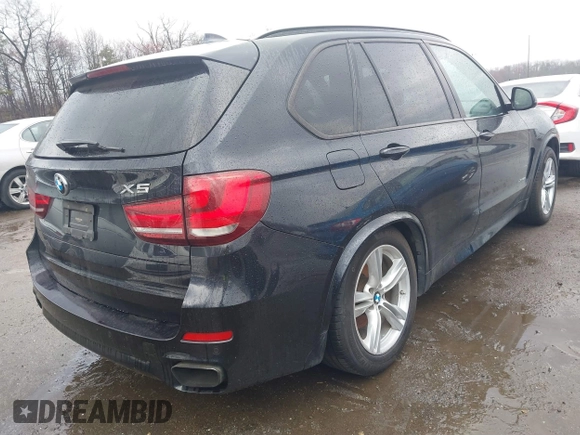 2014 BMW X5 xDrive50i with VIN 5UXKR6C59E0C03597, listed as a IAAI auction lot 41866944 with 65,890 mi miles. Bid and sale history available at carsss.com. Image 4.