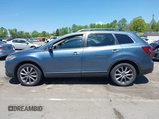 2015 Mazda CX-9 Grand Touring with VIN JM3TB3DV4F0448210, listed as a IAAI auction lot 42061711 with 149,289 mi miles. Bid and sale history available at carsss.com. Image 14.