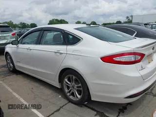 2016 Ford Fusion Titanium Hybrid with VIN 3FA6P0RU3GR190355, listed as a IAAI auction lot 42384309 with 157,172 mi miles and . Bid and sale history available at DreamBid. Image 14.
