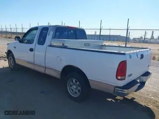 1998 Ford F-150 Standard with VIN 1FTZX1726WKB46576, listed as a IAAI auction lot 41881427 with 168,864 mi miles. Bid and sale history available at carsss.com. Image 3.