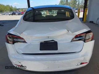 2023 Tesla Model 3 with VIN 5YJ3E1EA5PF610431, listed as a IAAI auction lot 42087181 with 19,777 mi miles and . Bid and sale history available at carsss.com. Image 6.