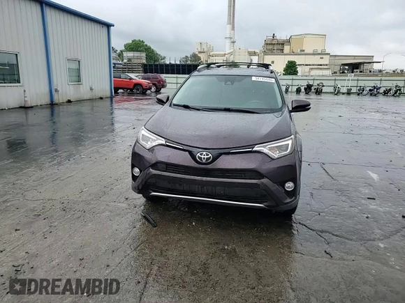 2016 Toyota RAV4 Limited with VIN 2T3YFREV8GW265040, listed as a Copart auction lot 54745845 with 73,733 mi miles and Salvage title. Bid and sale history available at DreamBid. Image 14.
