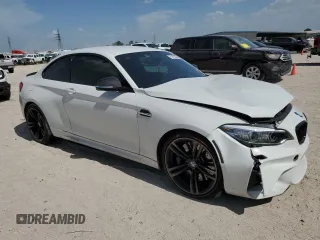 2018 BMW M2 z VIN WBS1J5C51JVD36522, wystawiony jako Copart lot #61423854 z przebiegiem 57 933 mil mil oraz Szkoda całkowita • Salvage title. Historia ofert i sprzedaży dostępna na DreamBid. Obrazek 4.