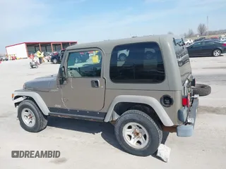 2006 Jeep Wrangler Sport Right Hand Drive with VIN 1J4F449S46P716520, listed as a IAAI auction lot 41763887 with 236,816 mi miles. Bid and sale history available at carsss.com. Image 14.