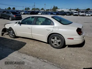 2003 Oldsmobile Aurora z VIN 1G3GS64C034160957, wystawiony jako Copart lot #76566524 z przebiegiem Nie podano mil oraz Szkody całkowita. Historia ofert i sprzedaży dostępna na DreamBid. Obrazek 2.