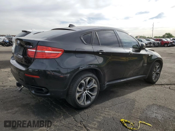 2013 BMW X6 xDrive50i z VIN 5UXFG8C57DL591149, wystawiony jako Copart lot #56979865 z przebiegiem 94 251 mil mil oraz Szkoda całkowita • Salvage title. Historia ofert i sprzedaży dostępna na DreamBid. Obrazek 3.