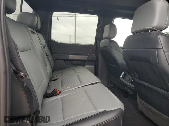 2023 Ford F-150 Lightning Pro z VIN 1FTVW1EV4PWG12935, wystawiony jako Copart lot #52685485 z przebiegiem Nie podano mil oraz Szkody całkowita. Historia ofert i sprzedaży dostępna na DreamBid. Obrazek 10.
