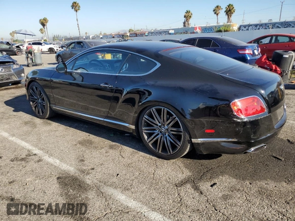 2014 Bentley Continental GT with VIN SCBFC7ZAXEC094256, listed as a Copart auction lot 62383493 with 45,392 mi miles and . Bid and sale history available at DreamBid. Image 2.