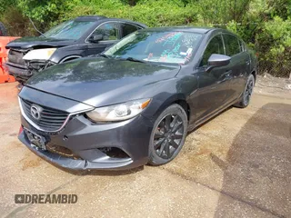 2014 Mazda 6 i Sport with VIN JM1GJ1U66E1129233, listed as a IAAI auction lot 42045330 with 195,071 mi miles and . Bid and sale history available at carsss.com. Image 2.