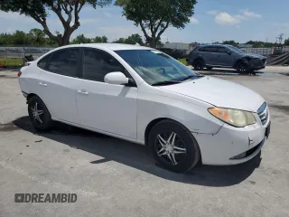 2010 Hyundai Elantra GLS with VIN KMHDU4AD2AU889047, listed as a Copart auction lot 59210735 with 307,475 mi miles and Salvage title. Bid and sale history available at DreamBid. Image 4.