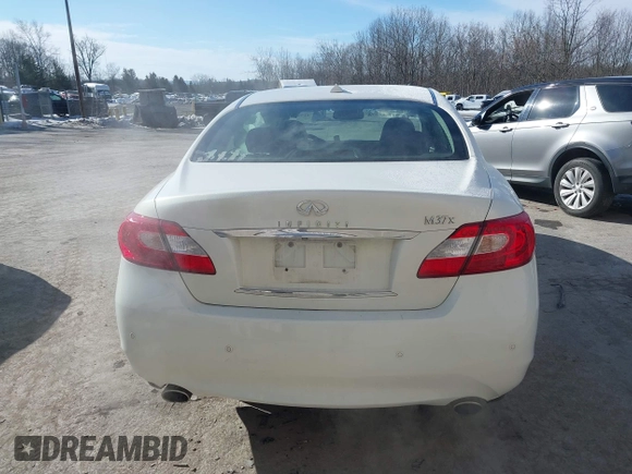 2013 Infiniti M z VIN JN1BY1AR6DM602021, wystawiony jako IAAI lot #41397484 z przebiegiem 226 584 mil mil oraz . Historia ofert i sprzedaży dostępna na DreamBid. Obrazek 16.