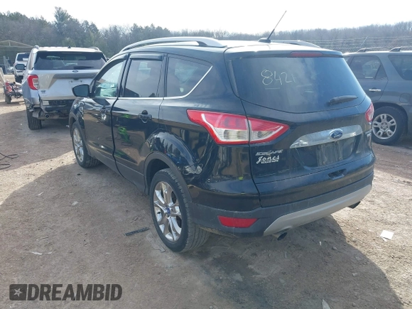 2016 Ford Escape Titanium with VIN 1FMCU9JX4GUB38303, listed as a IAAI auction lot 41788421 with 138,511 mi miles and . Bid and sale history available at DreamBid. Image 3.