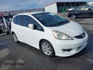 2011 Honda Fit Sport z VIN JHMGE8H56BC013298, wystawiony jako IAAI lot #42216385 z przebiegiem 146 980 mil mil oraz . Historia ofert i sprzedaży dostępna na DreamBid. Obrazek 1.