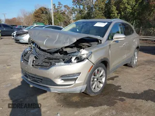 2015 Lincoln MKC z VIN 5LMCJ1A93FUJ26649, wystawiony jako IAAI lot #41832976 z przebiegiem 215 692 mil mil oraz . Historia ofert i sprzedaży dostępna na DreamBid. Obrazek 2.