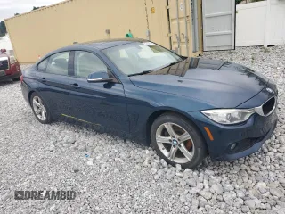 2015 BMW 4 Series 428i xDrive with VIN WBA4C9C57FD330687, listed as a Copart auction lot 67639034 with 114,779 mi miles and Salvage title. Bid and sale history available at DreamBid. Image 4.