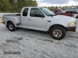 2003 Ford F-150 XL with VIN 1FTRX07W23KC51964, listed as a Copart auction lot 51669715 with Not provided miles and Salvage title. Bid and sale history available at DreamBid. Image 4.