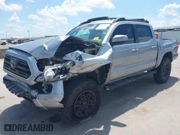 2018 Toyota Tacoma SR with VIN 3TMCZ5AN2JM172829, listed as a IAAI auction lot 42073847 with 136,671 mi miles and . Bid and sale history available at carsss.com. Image 18.