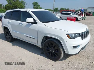 2018 Jeep Grand Cherokee Altitude with VIN 1C4RJFAG2JC303137, listed as a IAAI auction lot 42702238 with 80,162 mi miles and . Bid and sale history available at DreamBid. Image 1.