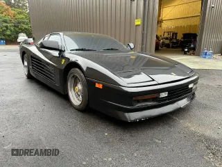 1988 Pontiac Fiero z VIN 1G2PE119XJP213392, wystawiony jako Copart lot #76264064 z przebiegiem 71 246 mil mil oraz Tytuł czysty. Historia ofert i sprzedaży dostępna na DreamBid. Obrazek 1.