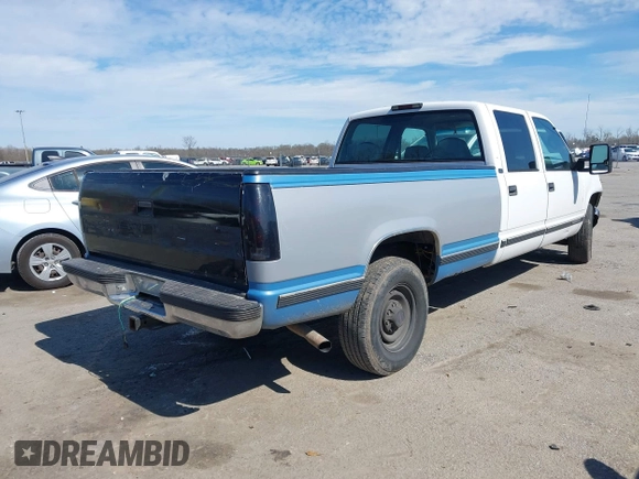 1996 GMC Sierra 1500 with VIN 1GTGC33R4TF018147, listed as a IAAI auction lot 41612770 with 106,443 mi miles and . Bid and sale history available at DreamBid. Image 4.