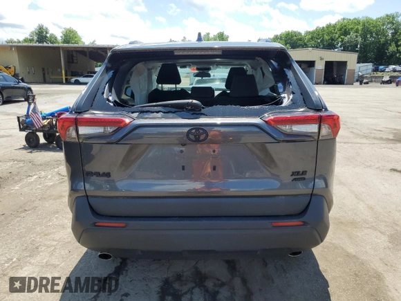 2023 Toyota RAV4 XLE with VIN 2T3P1RFV0PC331350, listed as a Copart auction lot 61234355 with 27,962 mi miles and Salvage title. Bid and sale history available at DreamBid. Image 6.