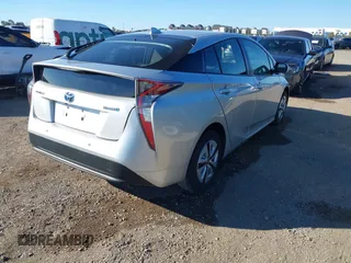 2018 Toyota Prius Two with VIN JTDKBRFU7J3073805, listed as a IAAI auction lot 41622743 with 89,027 mi miles and . Bid and sale history available at carsss.com. Image 4.
