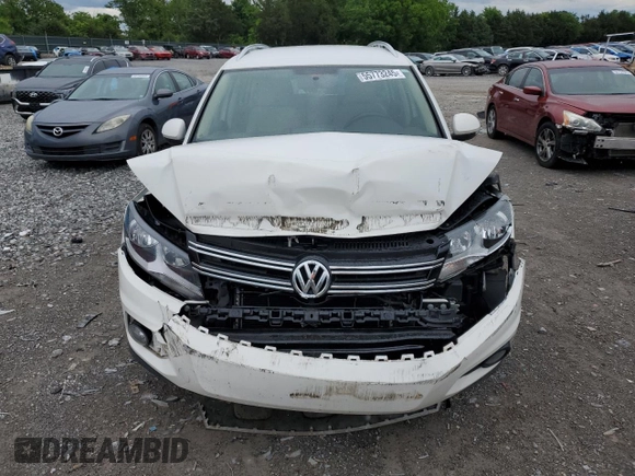 2014 Volkswagen Tiguan SE z VIN WVGAV3AX5EW551477, wystawiony jako Copart lot #55773245 z przebiegiem 153 437 mil mil oraz Czysty tytuł • Clean title. Historia ofert i sprzedaży dostępna na DreamBid. Obrazek 5.