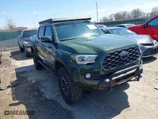 2021 Toyota Tacoma 4WD SR with VIN 3TMCZ5ANXMM382874, listed as a IAAI auction lot 41965388 with 62,178 mi miles. Bid and sale history available at carsss.com. Image 1.