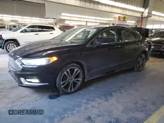 2018 Ford Fusion Titanium с VIN 3FA6P0K95JR223580, выставлен на аукционе Copart как лот 86442004 с пробегом 75 817 миль миль и Списание • Salvage title. История ставок и продаж доступна на DreamBid. Изображение 1.