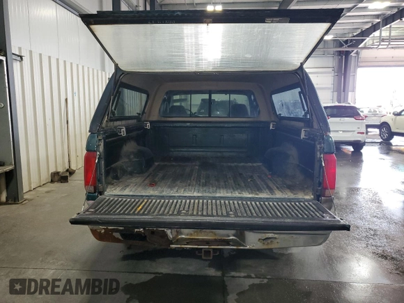 1994 Ford F-150 with VIN 1FTEX14N3RKB07414, listed as a Copart auction lot 70826944 with 130,998 mi miles and Salvage Title. Bid and sale history available at carsss.com. Image 6.
