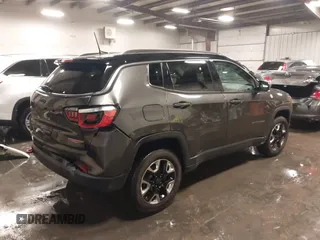 2018 Jeep Compass Trailhawk with VIN 3C4NJDDB4JT210451, listed as a IAAI auction lot 41239258 with 90,552 mi miles and . Bid and sale history available at carsss.com. Image 4.