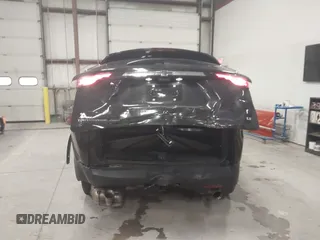 2022 Chevrolet Traverse LT with VIN 1GNEVHKW3NJ124361, listed as a IAAI auction lot 41033053 with 27,869 mi miles and . Bid and sale history available at DreamBid. Image 6.