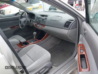2003 Toyota Camry LE with VIN 4T1BE30K13U168509, listed as a IAAI auction lot 42220735 with 210,328 mi miles and . Bid and sale history available at DreamBid. Image 5.