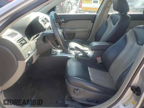 2010 Mercury Milan Hybrid with VIN 3MEDM0L36AR601599, listed as a Copart auction lot 57247965 with 163,324 mi miles and Clean title. Bid and sale history available at DreamBid. Image 7.