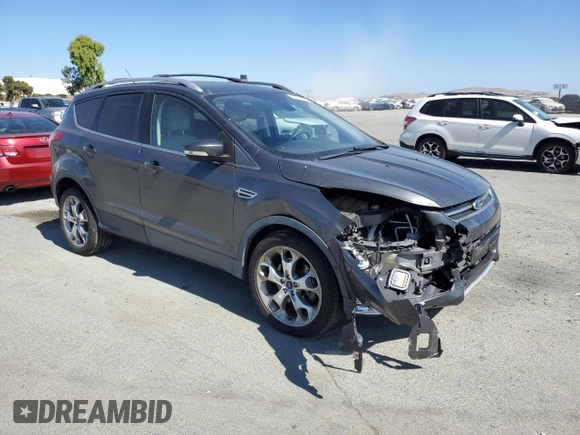 2015 Ford Escape Titanium with VIN 1FMCU9J99FUC13108, listed as a Copart auction lot 60815265 with 70,938 mi miles and Salvage title. Bid and sale history available at DreamBid. Image 4.
