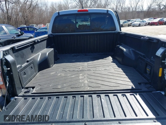 2013 Toyota Tacoma with VIN 3TMMU4FN8DM054973, listed as a IAAI auction lot 41659232 with 113,734 mi miles. Bid and sale history available at carsss.com. Image 12.