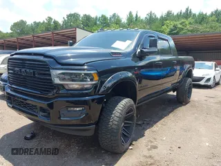 2020 Ram 2500 Laramie with VIN 3C6UR5NL9LG163597, listed as a IAAI auction lot 42545909 with Not provided miles and . Bid and sale history available at DreamBid. Image 2.