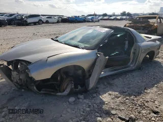 1999 Pontiac Firebird Formula with VIN 2G2FV22G2X2233618, listed as a Copart auction lot 82895584 with 0 mi miles and Salvage Title. Bid and sale history available at carsss.com. Image 1.