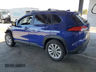 2022 Toyota Corolla Cross LE with VIN 7MUCAAAG6NV021103, listed as a Copart auction lot 56882015 with 21,769 mi miles and Salvage title. Bid and sale history available at DreamBid. Image 2.