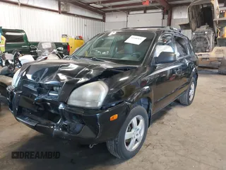 2006 Hyundai Tucson GL with VIN KM8JM12B96U252484, listed as a IAAI auction lot 42100855 with 273,655 mi miles. Bid and sale history available at carsss.com. Image 17.