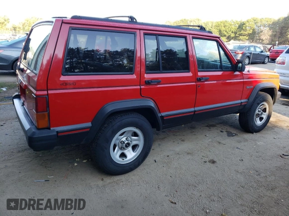 1996 Jeep Cherokee Sport with VIN 1J4FJ68S8TL285995, listed as a Copart auction lot 73333574 with 187,429 mi miles and Salvage Title. Bid and sale history available at carsss.com. Image 3.