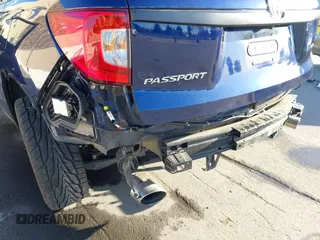 2020 Honda Passport Touring with VIN 5FNYF7H90LB004665, listed as a IAAI auction lot 41669821 with 59,768 mi miles and . Bid and sale history available at DreamBid. Image 6.