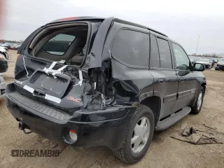 2003 GMC Envoy SLE with VIN 1GKDT13S532122751, listed as a Copart auction lot 46166415 with 139,621 mi miles and Salvage Title. Bid and sale history available at carsss.com. Image 3.