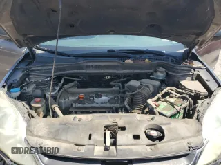 2010 Honda CR-V LX z VIN 5J6RE3H38AL034061, wystawiony jako Copart lot #54978905 z przebiegiem 154 951 mil mil oraz Szkoda całkowita • Salvage title. Historia ofert i sprzedaży dostępna na DreamBid. Obrazek 11.